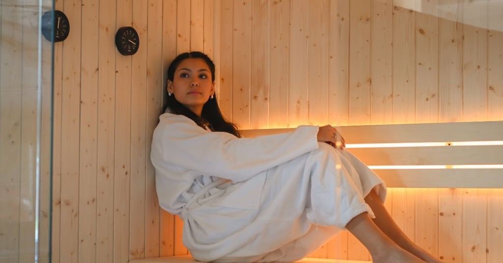 woman relaxing at sauna room